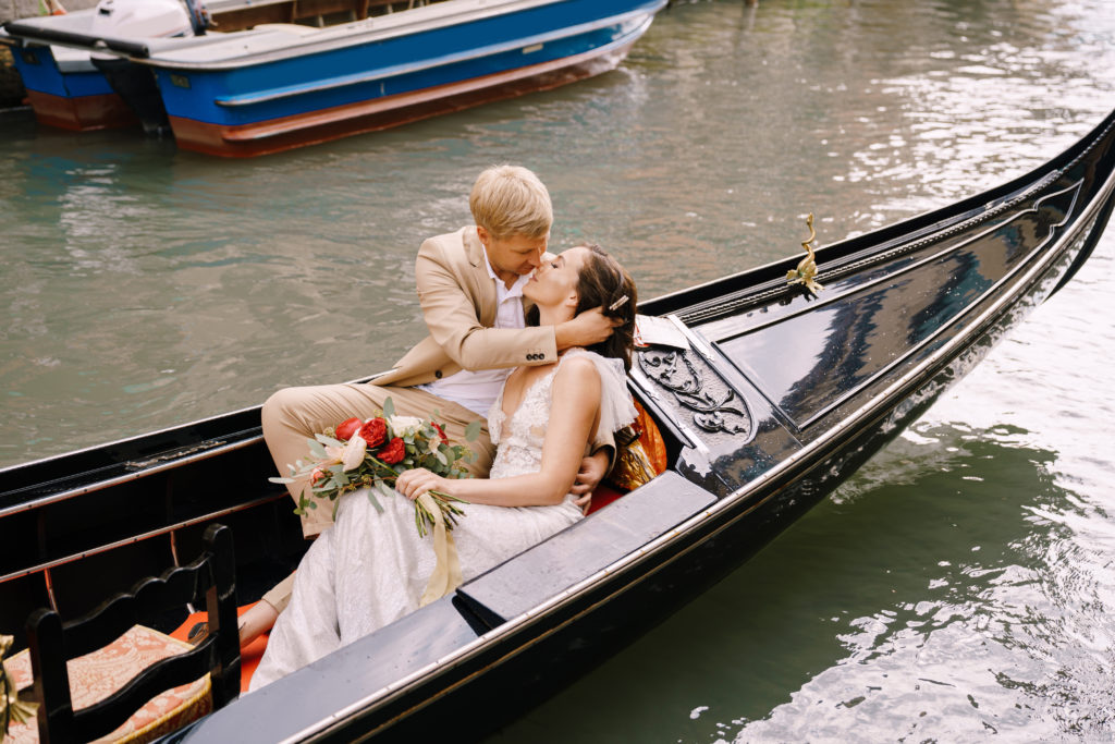 Bridal couple in Venice enjoying a moment alone after the wedding ceremony.